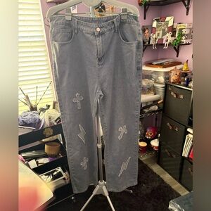 Light Blue Jeans with Cross and Lightning Bolt Patches